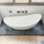 ALFI AB9951 73" White Solid Surface Smooth Resin Soaking Slipper Bathtub  with a matte finish in a white background